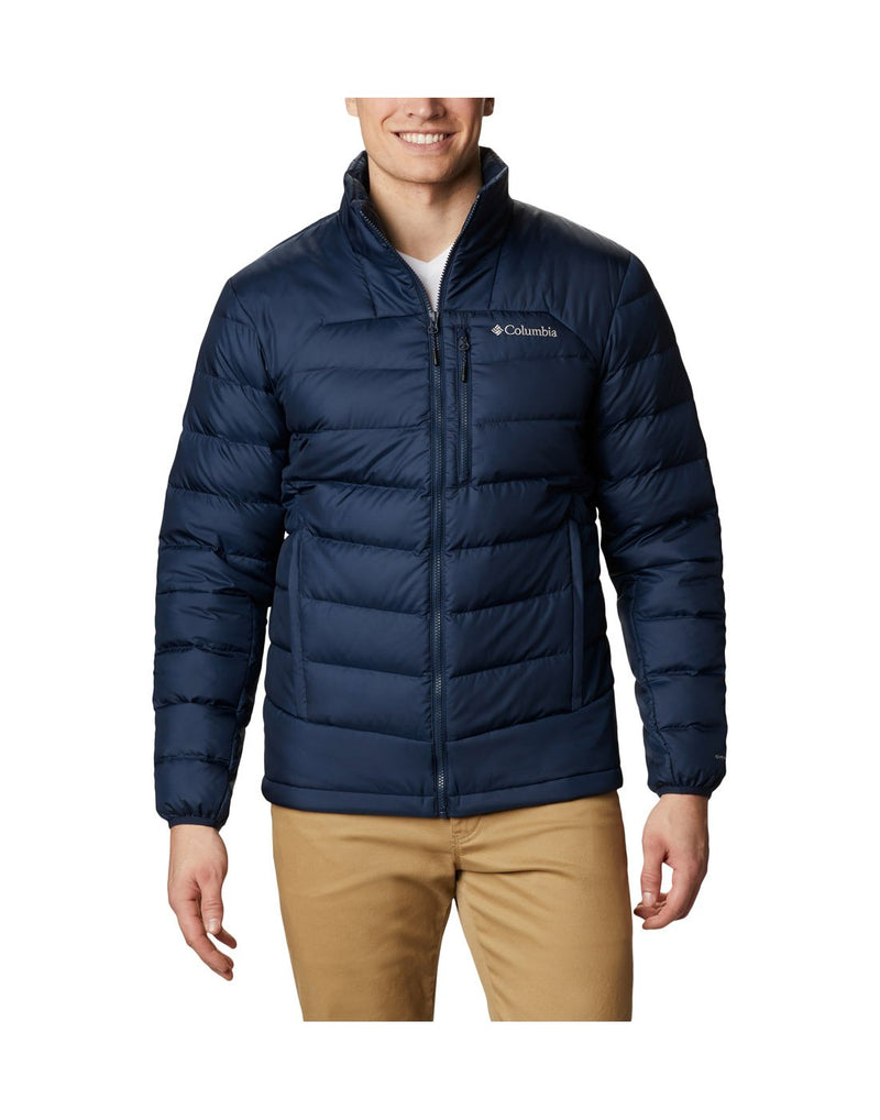 Man wearing Columbia Men's Autumn Park™ Down Jacket in collegiate navy, zipped up, front view