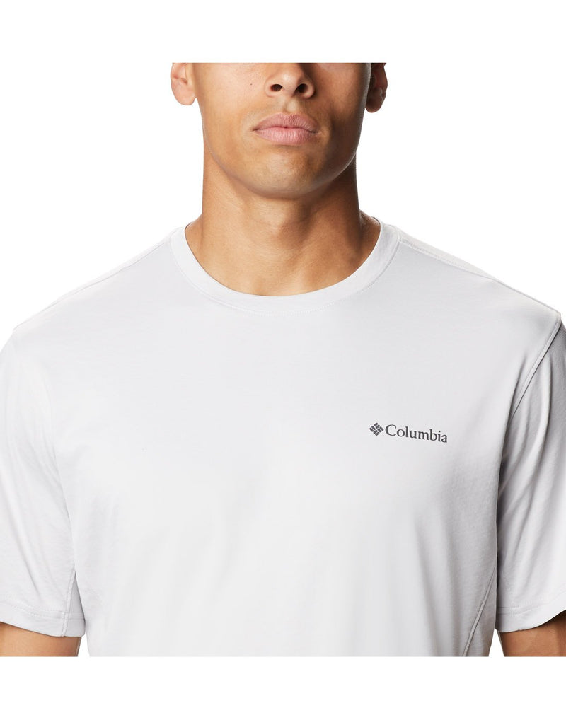 Close up of model wearing Columbia Men's Zero Ice Cirro-Cool™ Short Sleeve Shirt - nimbus grey with Columbia logo over left breast