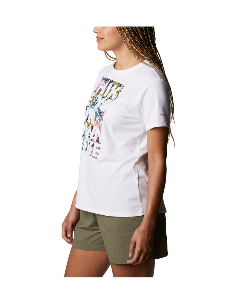 Model wearing Columbia Women's Sun Trek™ Graphic T-Shirt - white, side view