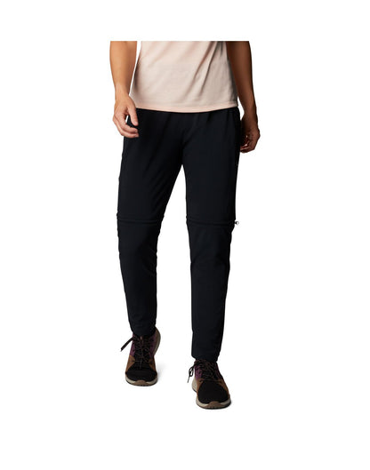 Model wearing Columbia Women's Pleasant Creek™ Convertible Pants - black, front view