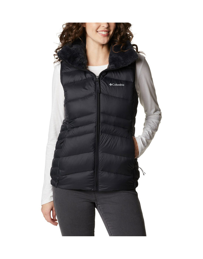 Woman wearing Columbia Women's Autumn Park™ Vest in black, zipped up, front view