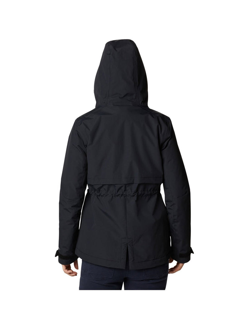Woman wearing Columbia Women's Hadley Trail™ Jacket in black with hood up, back view