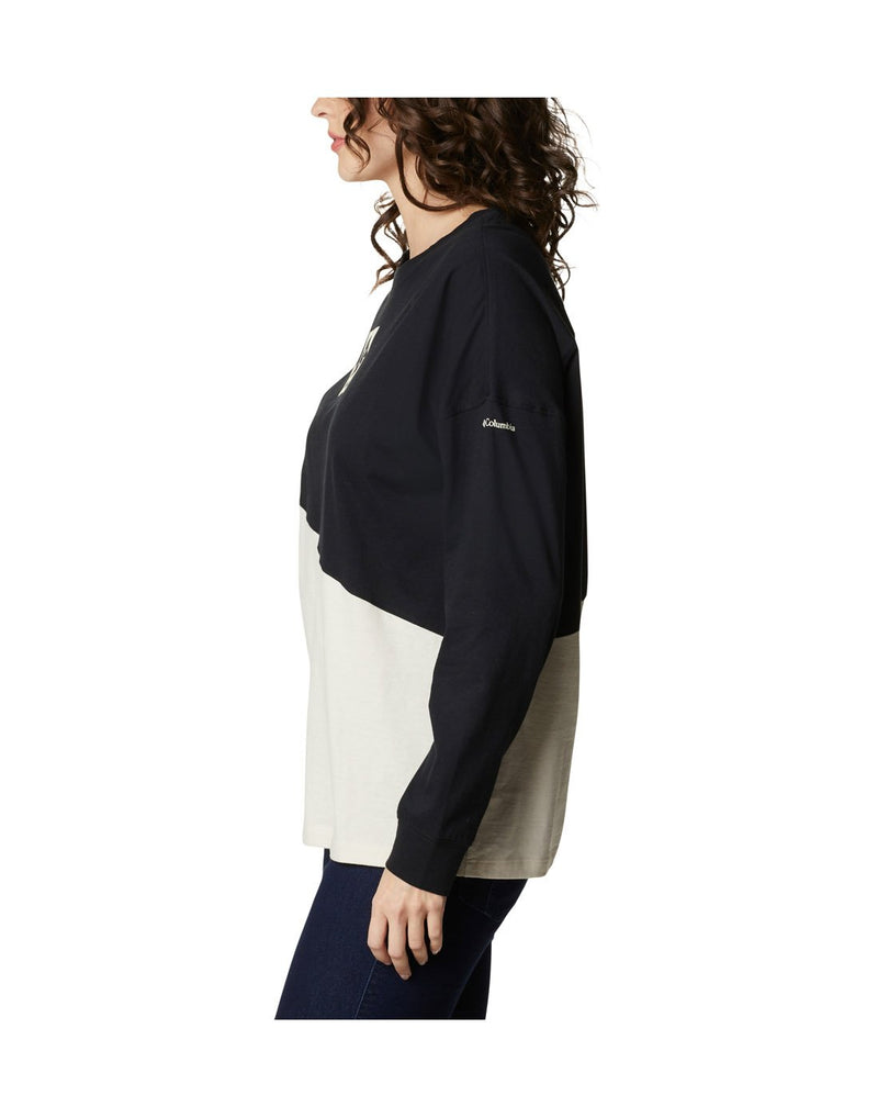 Woman wearing Columbia Women's Columbia Park™ Long Sleeve Tee, side view with Columbia logo on left arm