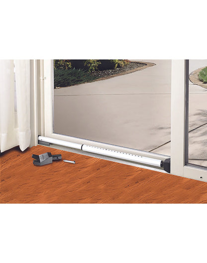Master Lock Security Bar installed at the bottom of a sliding door