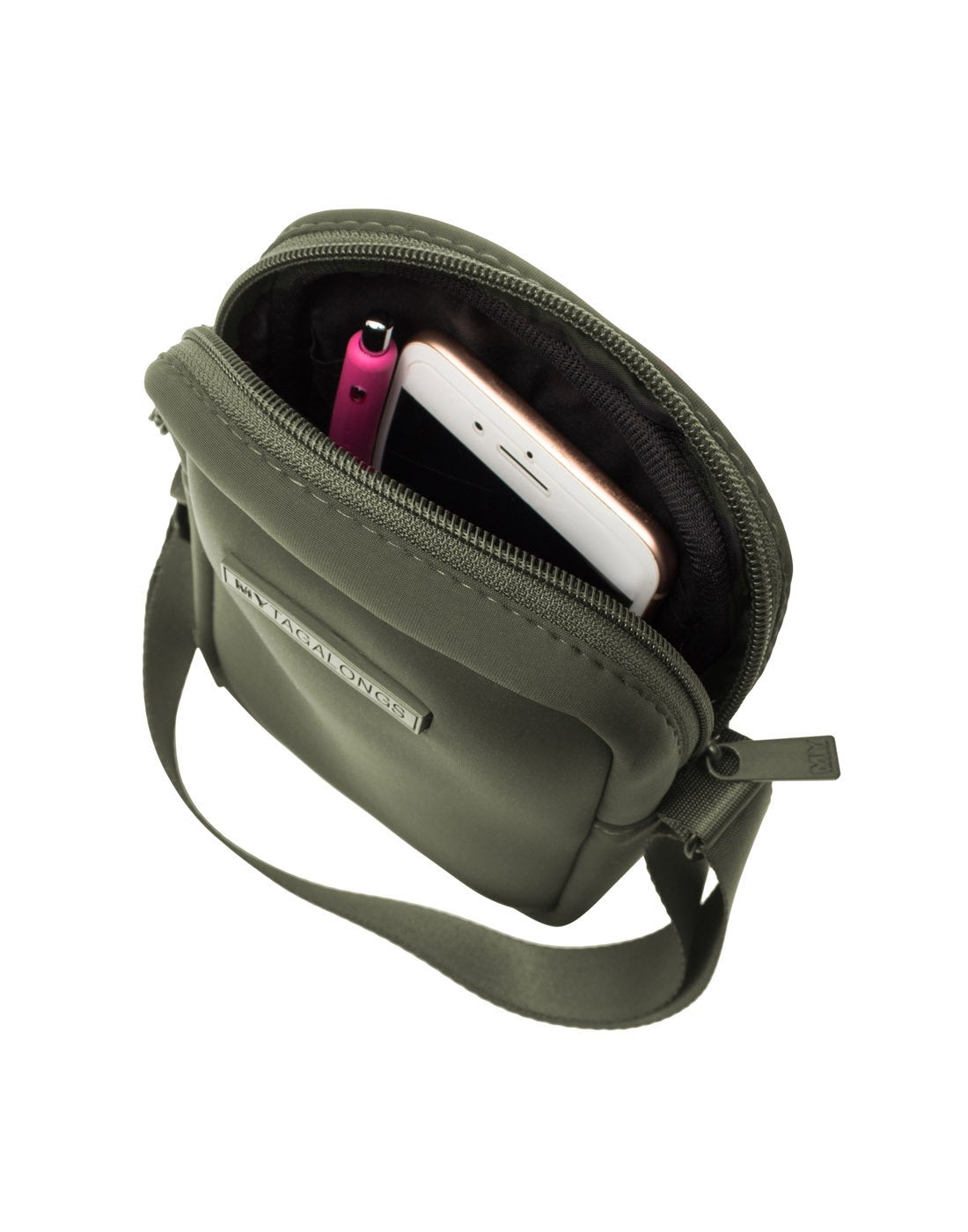 MyTagAlongs Mini Crossbody - everleigh hunter green colour, open showing pen and phone inside