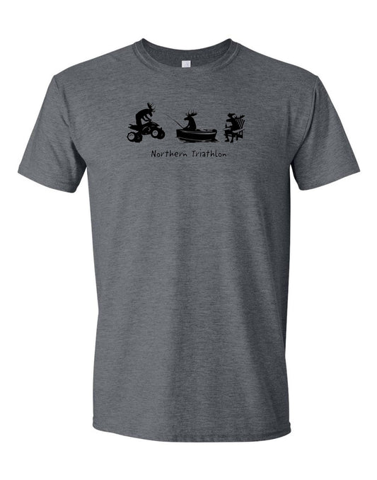 Product Image – Unisex Soft Style T-Shirt in dark heather grey with black silhouette pictures of a moose riding an ATV, a moose fishing in a boat, and a moose sitting in a chair with a beer and words Northern Triathlon below