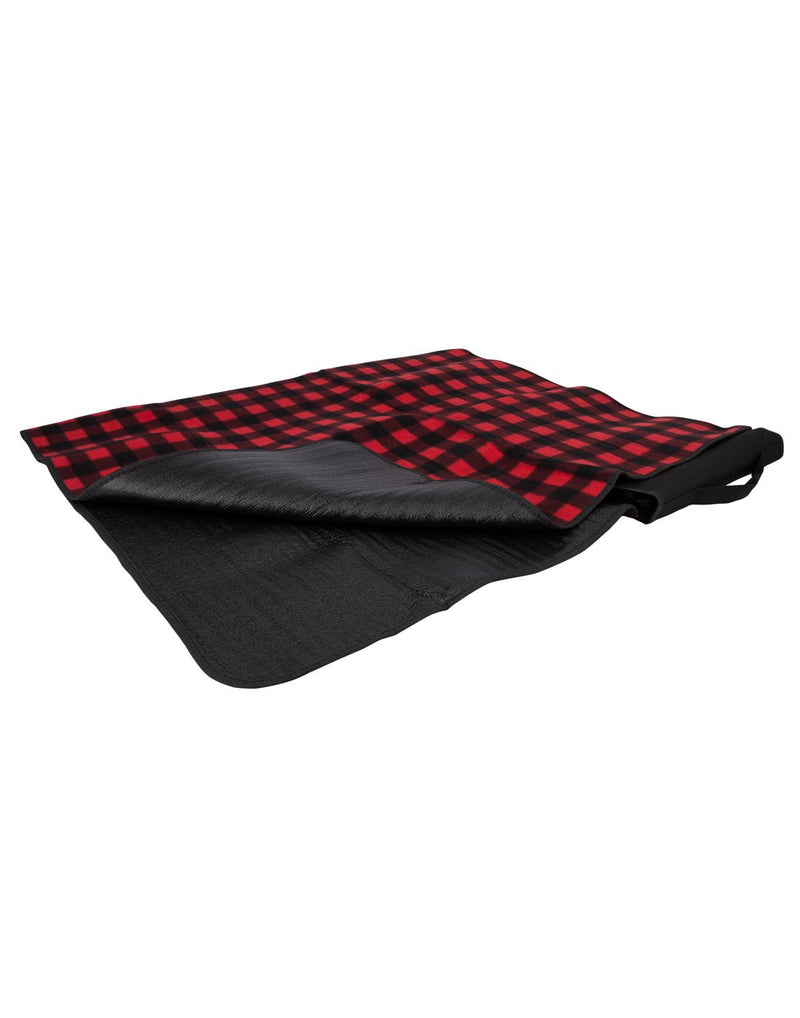Red and black buffalo plaid Austin House Travel Picnic Blanket unfolded with corner flipped up to show waterproof bottom