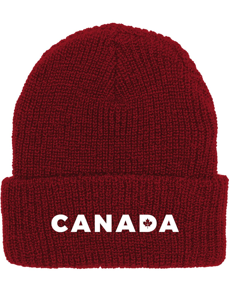 Burgundy knit beanie hat with cuff and embroidered word Canada in white with maple leaf cut out in the letter D
