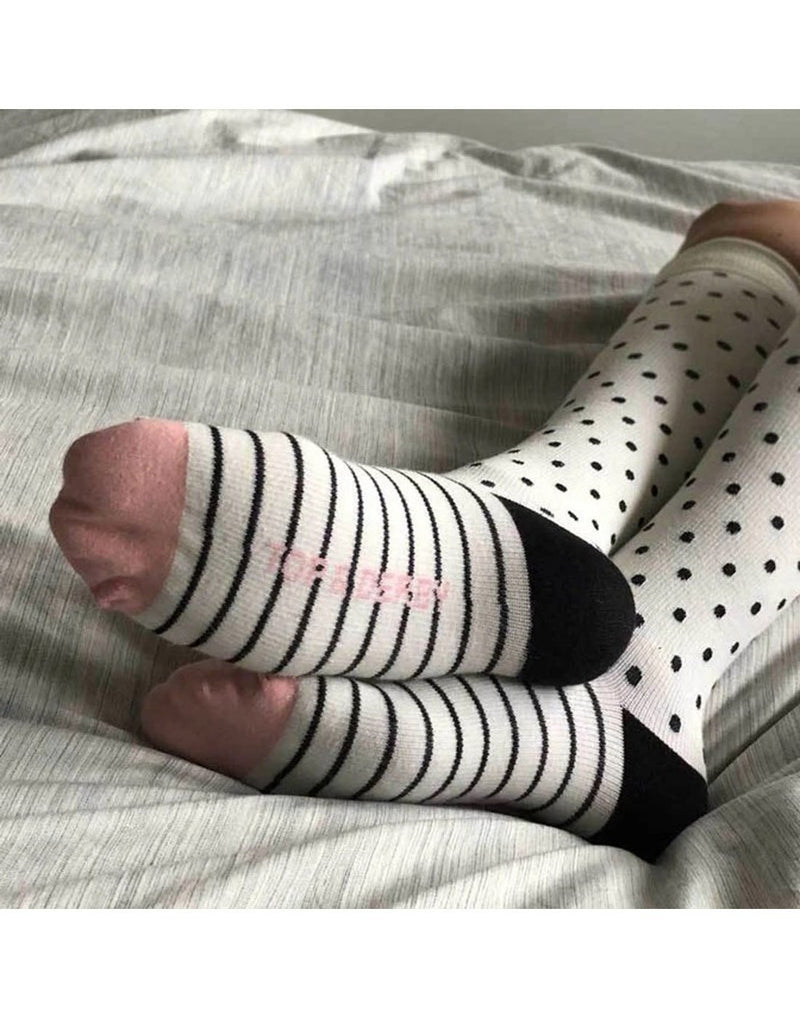 Wearing unisex cotton knee-high compression socks - breakfast club pair view