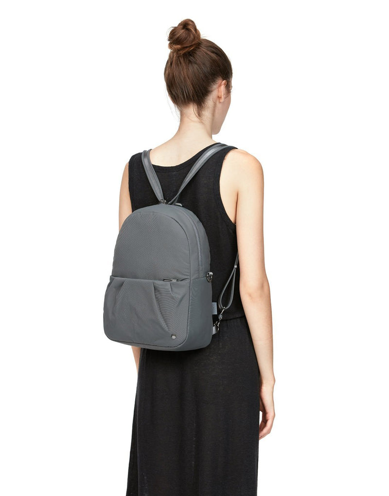 Women carrying citysafe cx econyl convertible anti-theft backpack front view