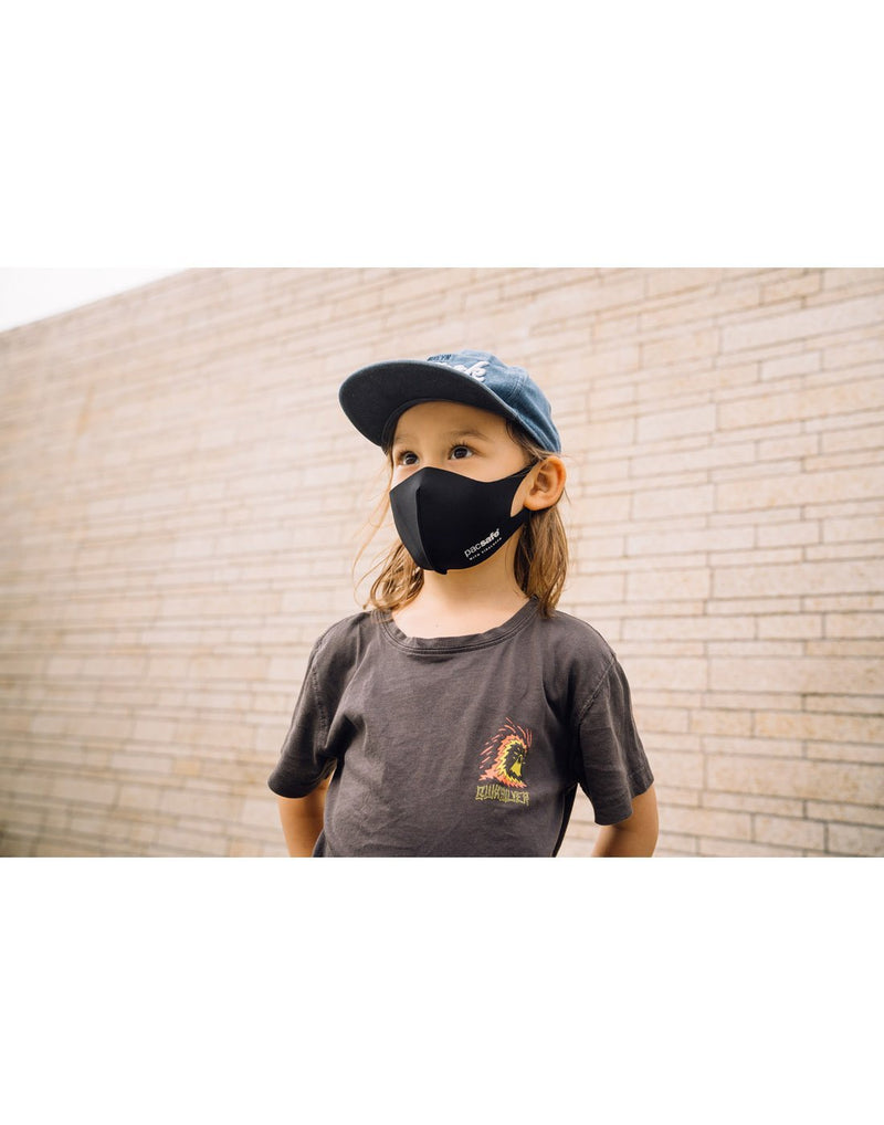 Kid wearing black colour mask