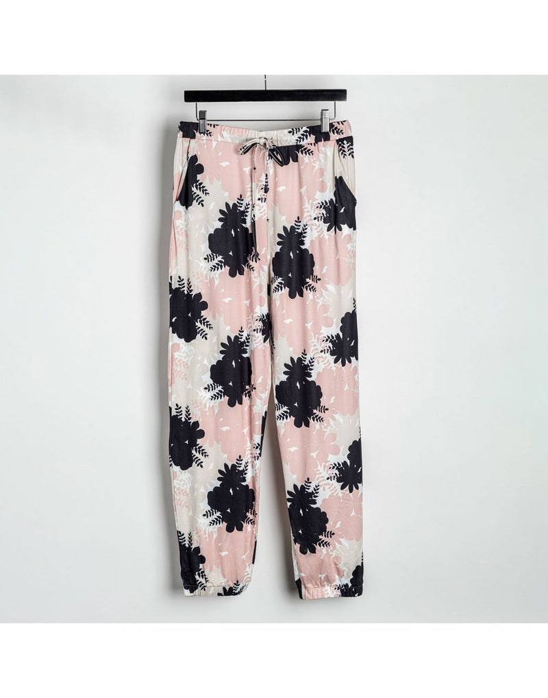 Howard's floral lounge pants in blush colour, clipped to a hanger