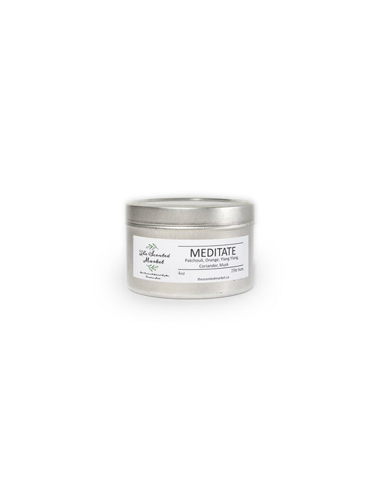 Product Image – The Scented Market Meditate 4oz Essential Oil Candle in a silver tin with lid on, front view