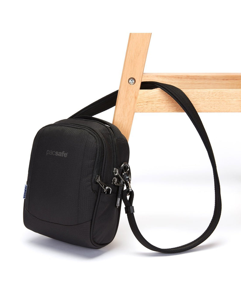 Pacsafe metrosafe ls100 econyl black colour recycled crossbody bag detachable strap