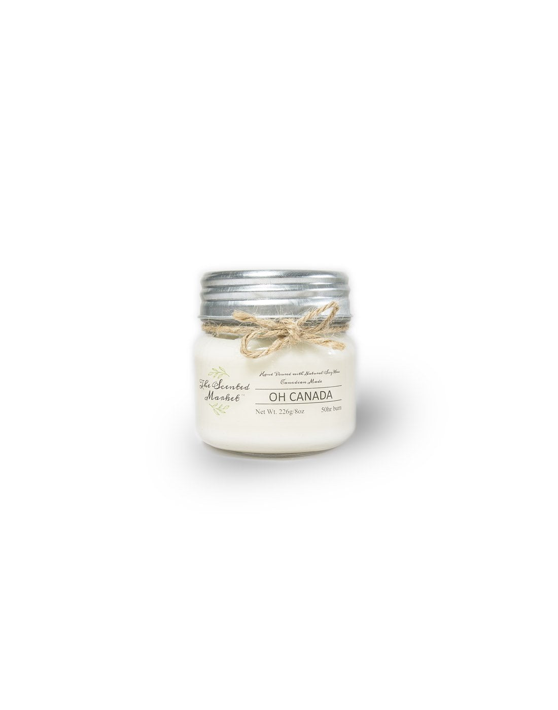 The Scented Market Oh Canada 8oz Soy Wax Candle front view in a glass jar with metal lid and tied with a twine bow