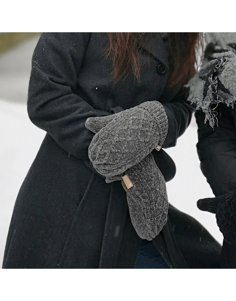 Girl wearing grey colour mittens
