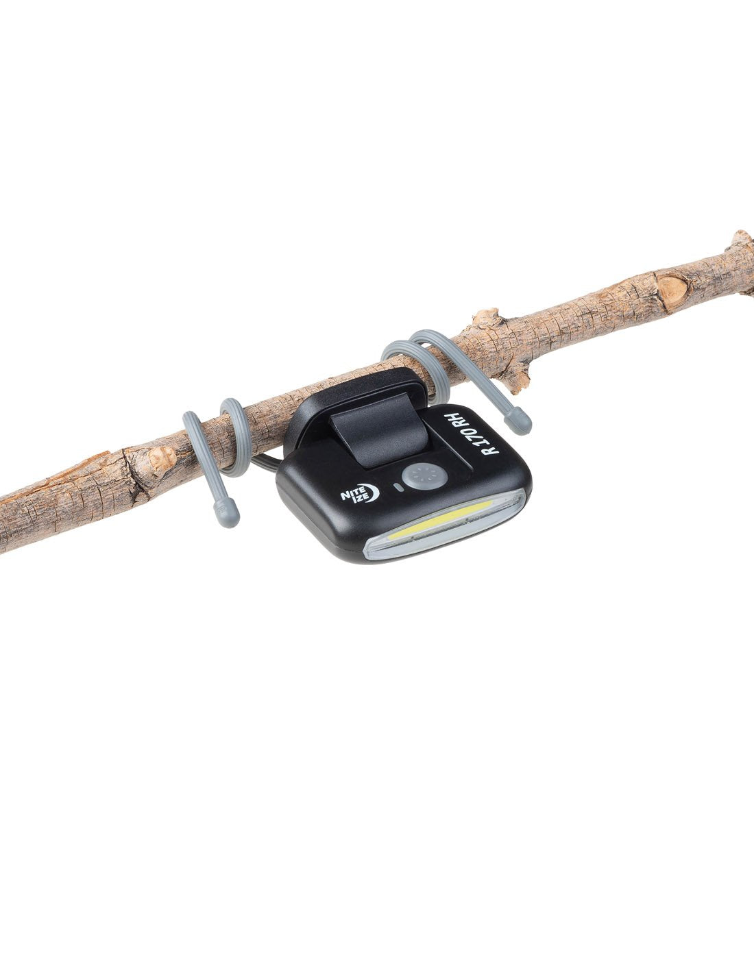 Nite Ize Radiant® 170 Rechargeable Task Light secured to branch with attached gear ties