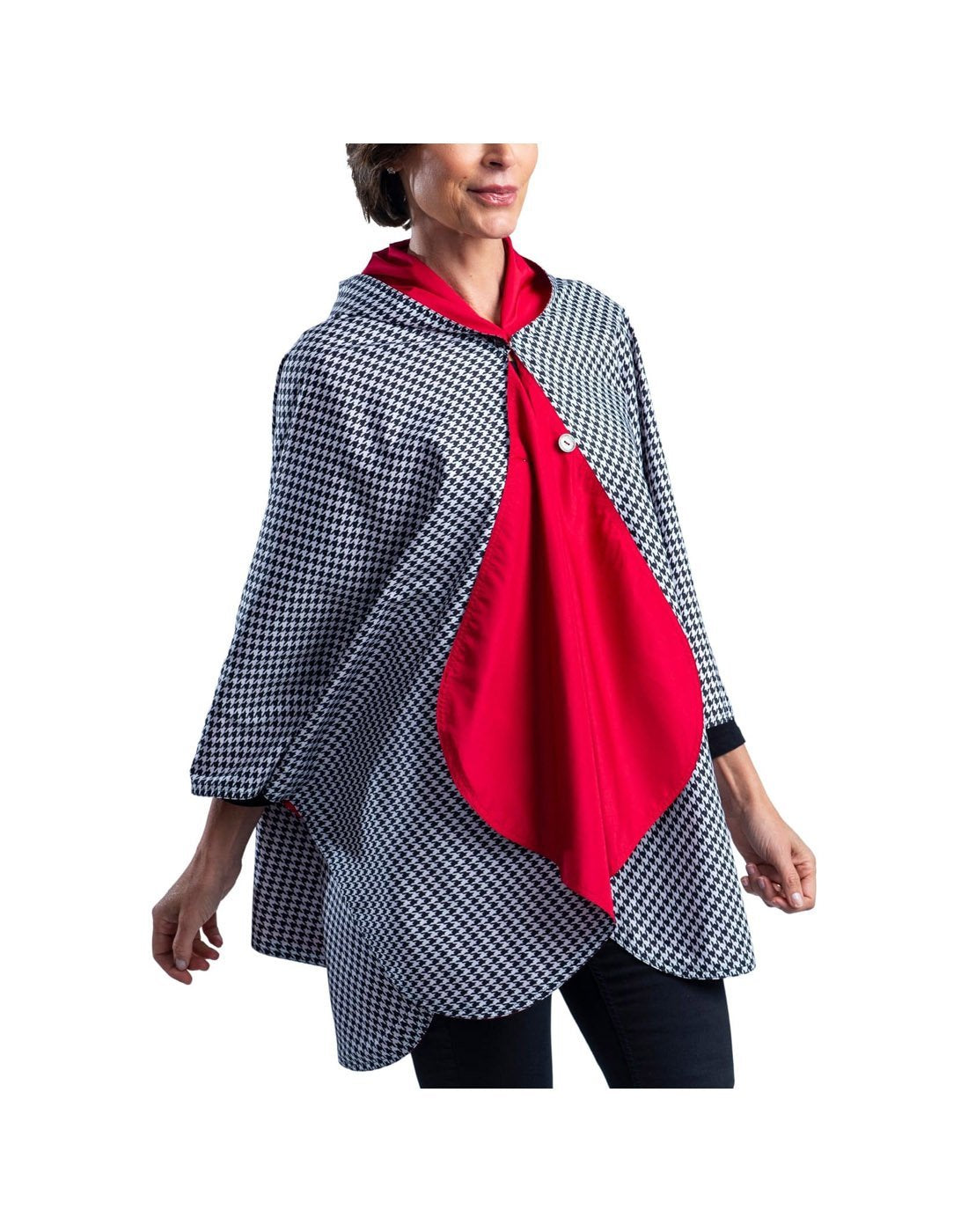 RainCaper hooded travel cape - crimson/black & white houndstooth colour front view