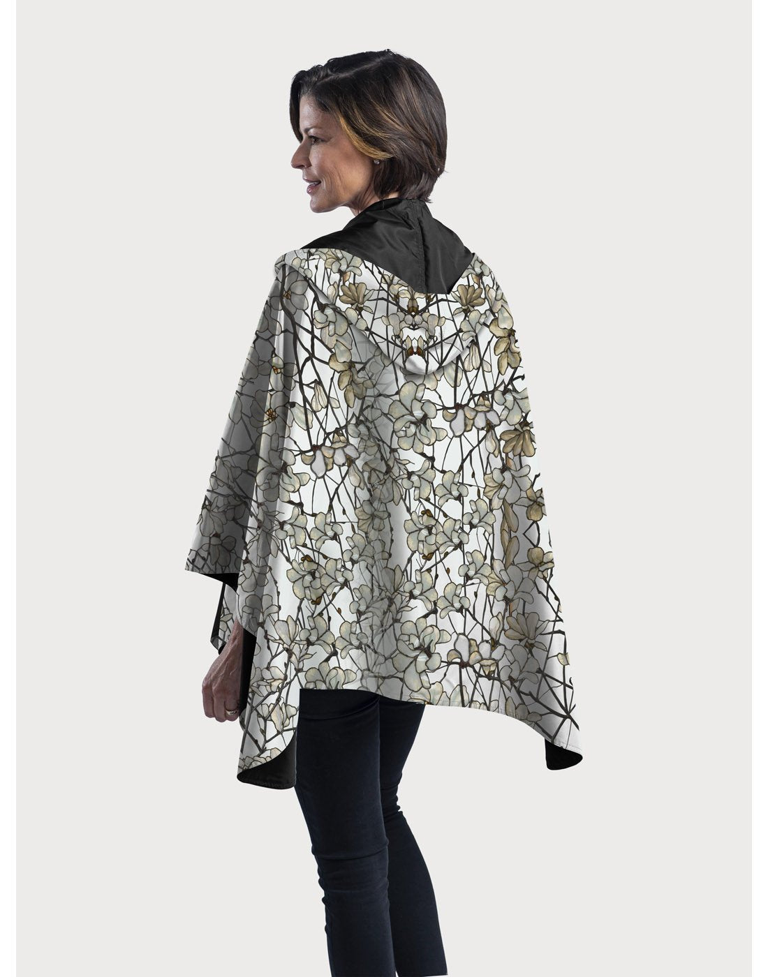 RainCaper hooded travel cape - tiffany magnolia design back view