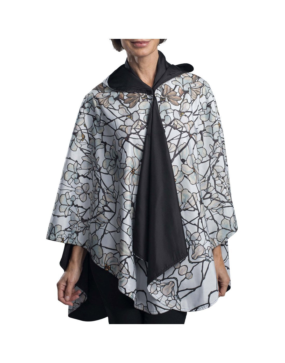 RainCaper hooded travel cape - tiffany magnolia design front view