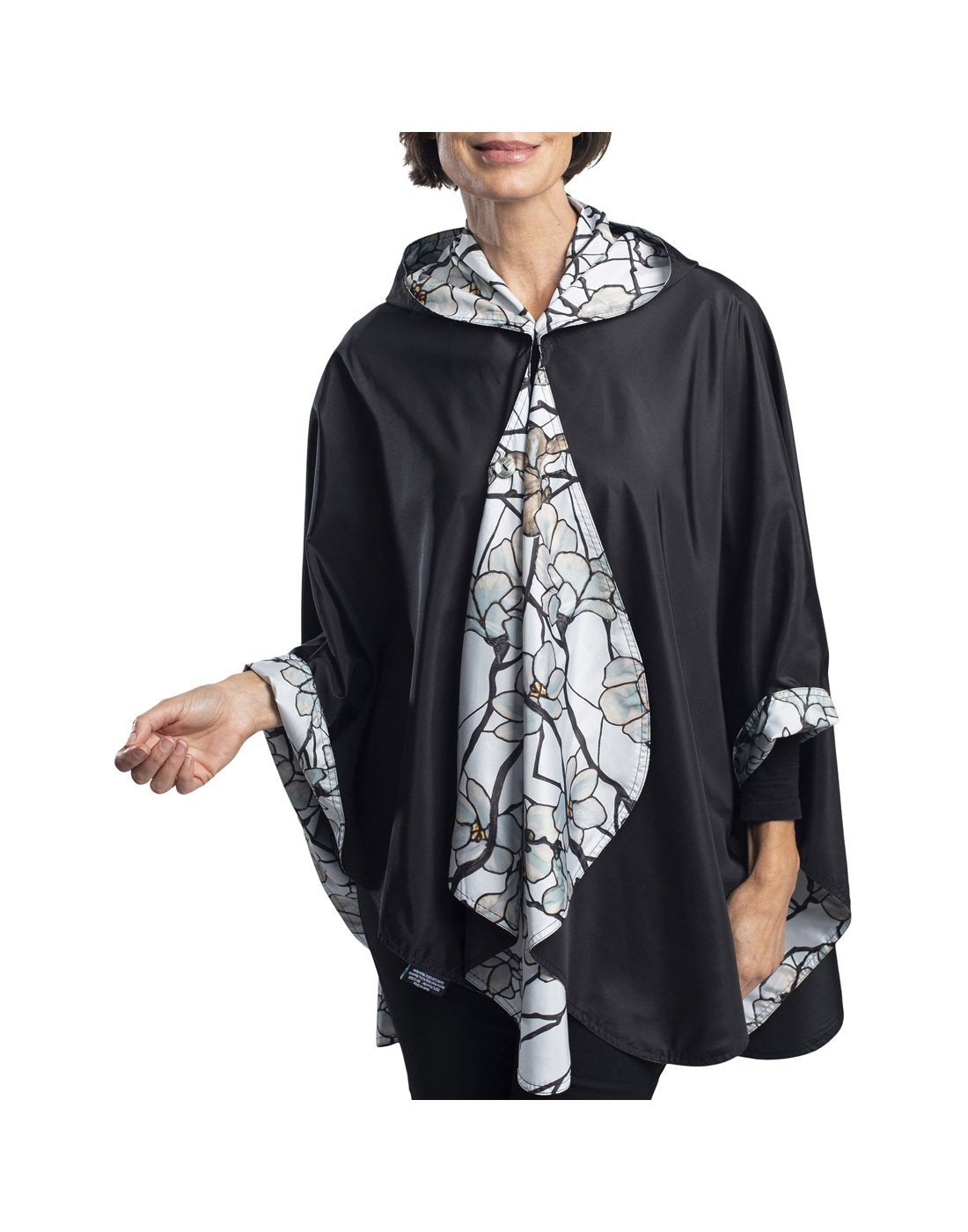 RainCaper hooded travel cape - tiffany magnolia design reverse look