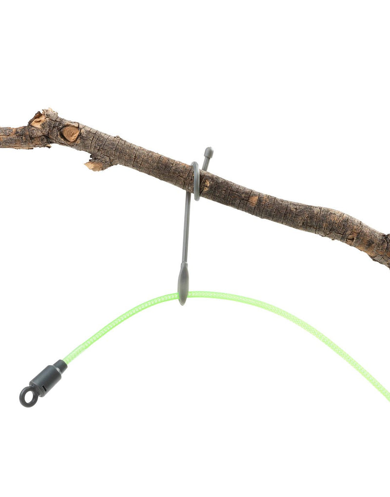 Nite Ize Radiant® Rechargeable Shineline™ in green attached to tree branch with included cable ties