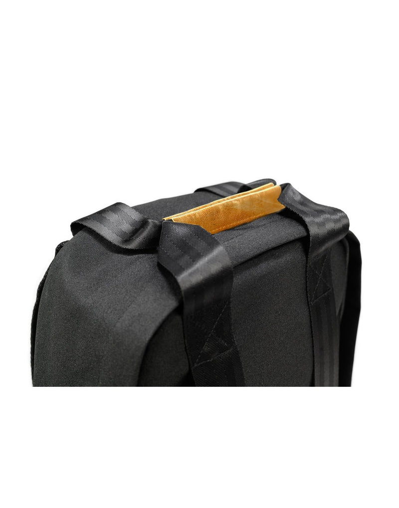 Close up of PKG Rosseau Mid II Backpack brown tote handles on top