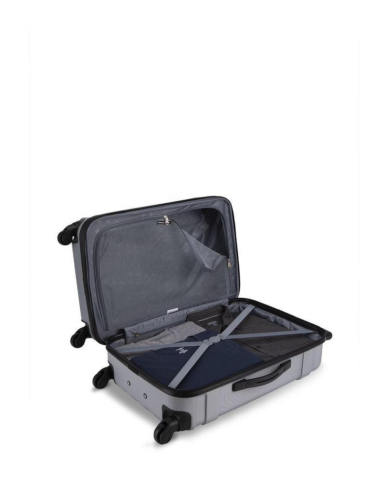 Swiss Gear Tyax silver luggage open to show interior tie down straps and zippered mesh divider