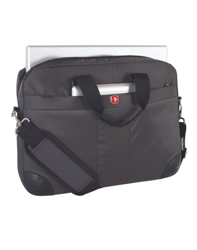 Swiss Gear Slim Computer Bag in black, front view with laptop sticking out of open back and tablet slipped into side pocket