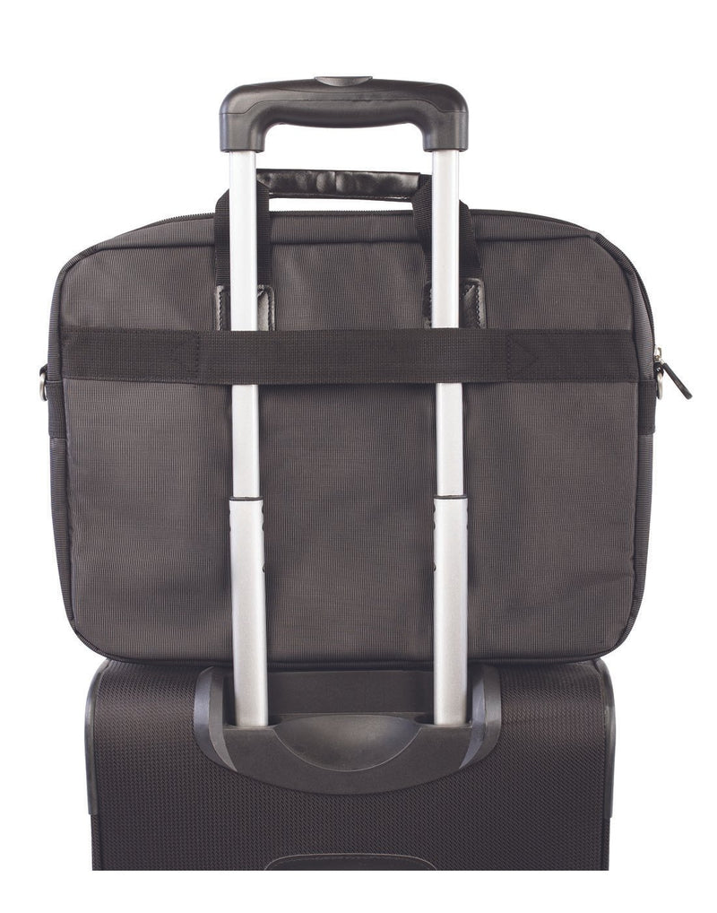Swiss Gear Slim Computer Bag, back view, attaached to telescopic handle of a black carry-on luggage