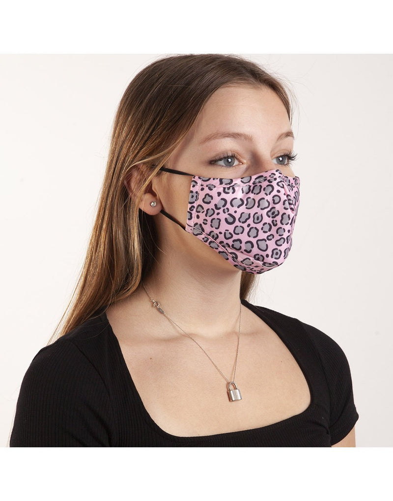 Girl using bondstreet animal print kids face mask