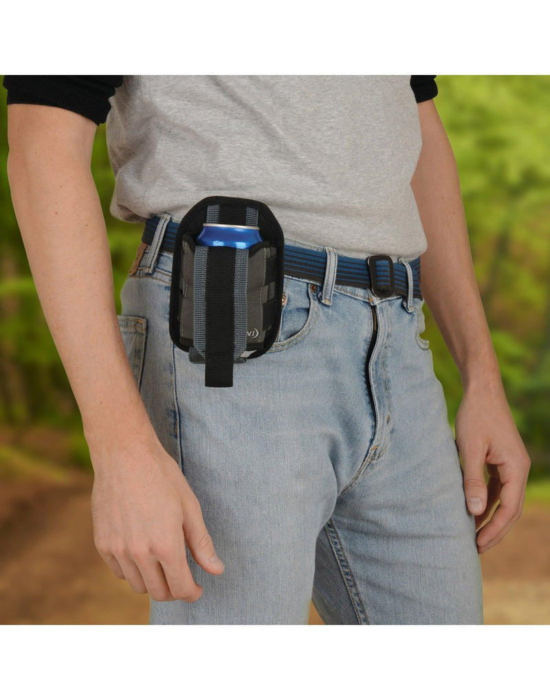Man using Nite ize traveler™ drink holster with can attached to belt