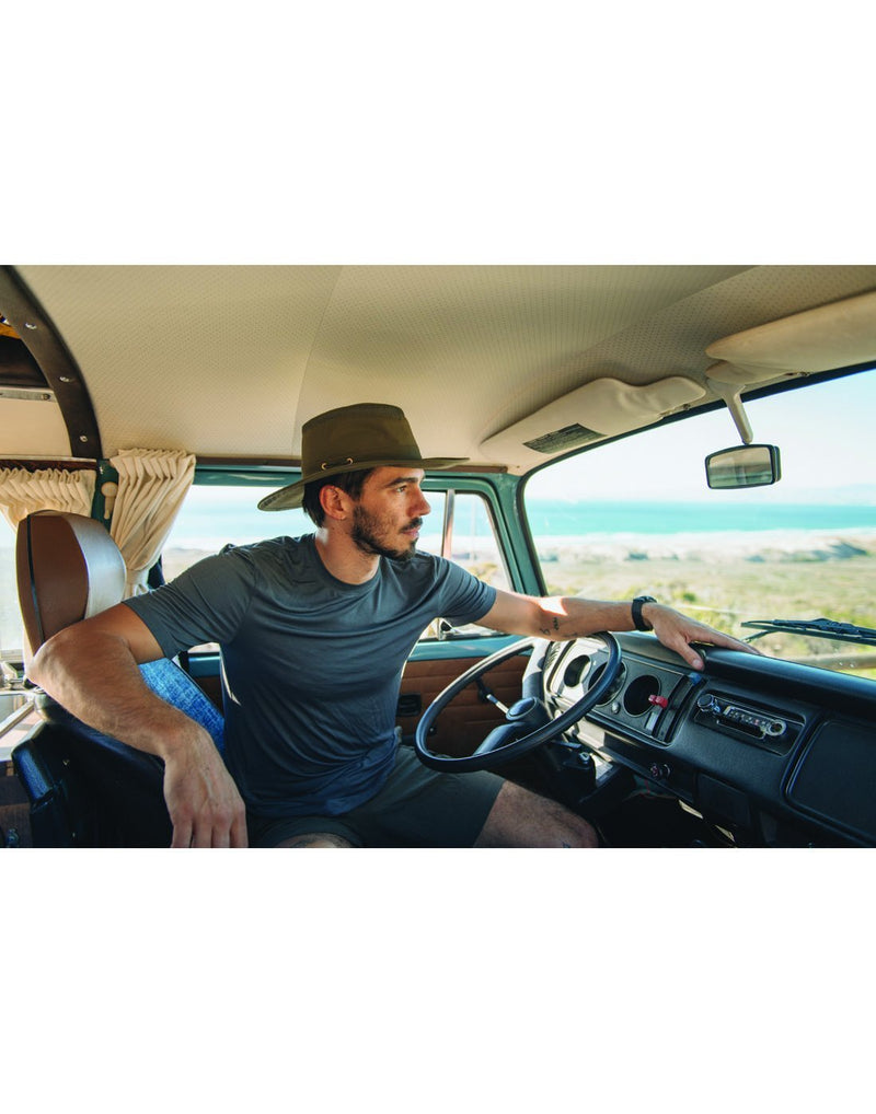 Men wearing Olive colour hat while driving