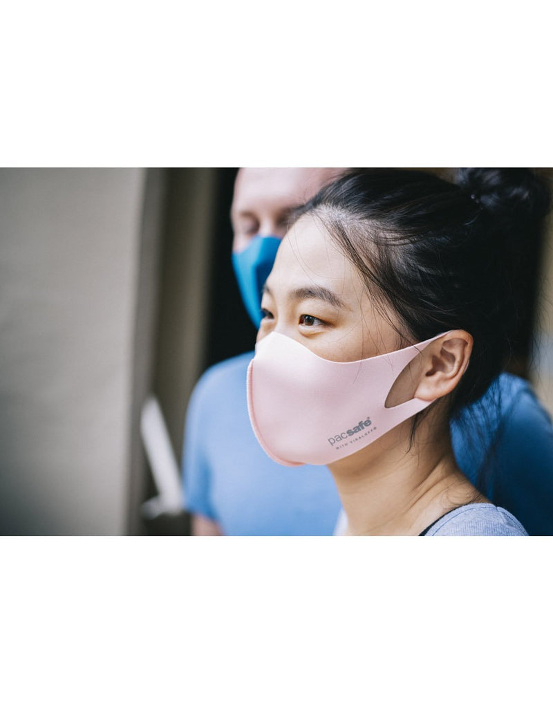 Girl wearing pink colour mask