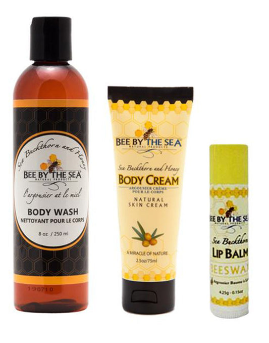 Product Image – Bee by the Sea Winter Indulgence Gift Set contents, body wash, body cream tube, and lip balm