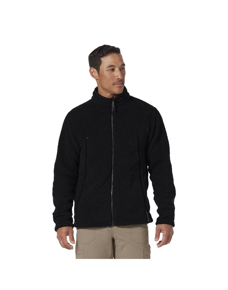 Man wearing Royal Robbins Men's Outerzone Fleece Full Zip in jet black, zipped up, front view
