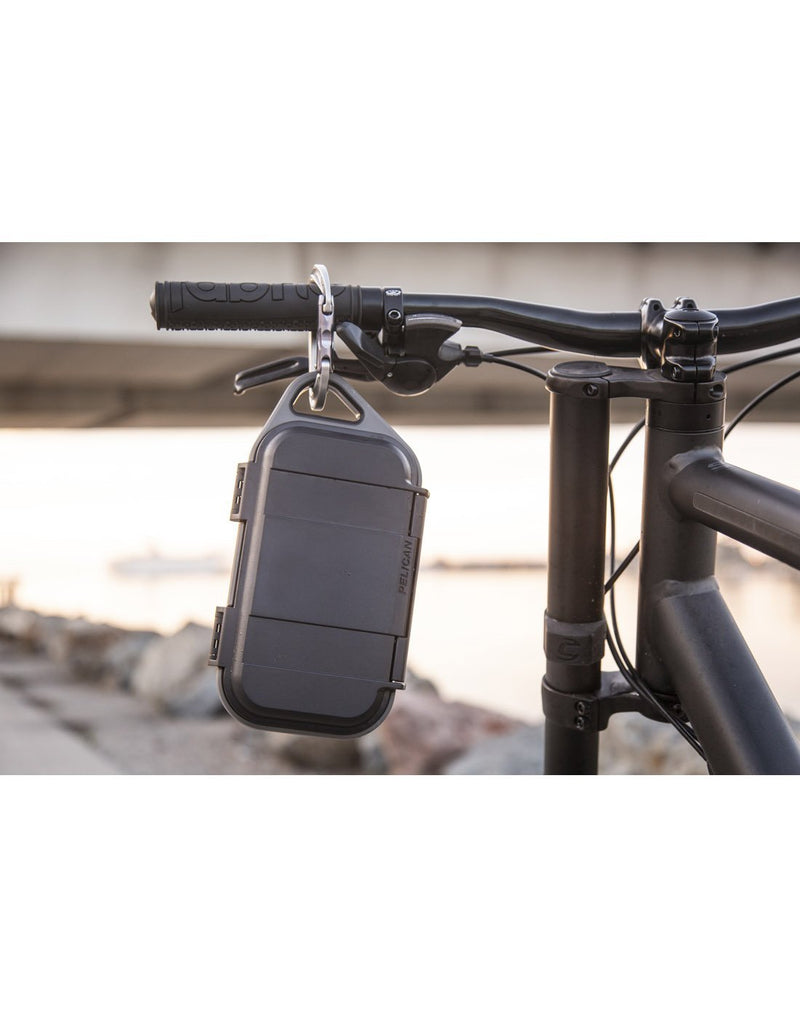 Pelican go™ g40C personal utility charge case hanged on bicycle front view